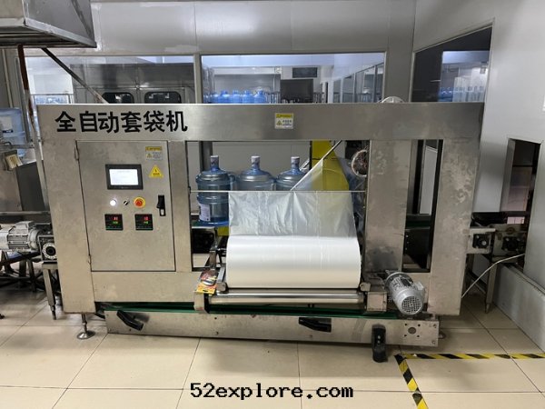 全(quán)自(zì)動(dòng)套袋(dài)機(jī)